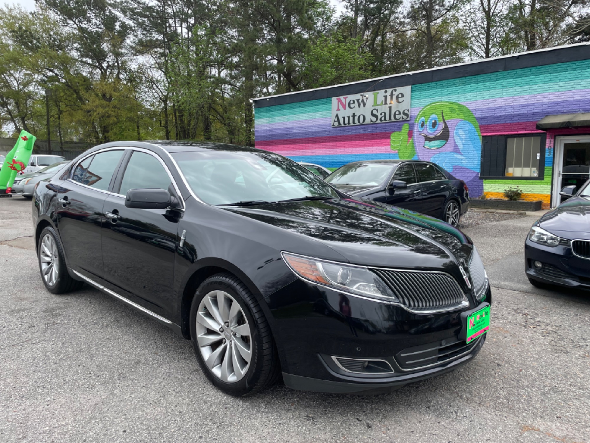 photo of 2016 LINCOLN MKS - Fully Loaded! Super Comfortable!! Financing Available!!!